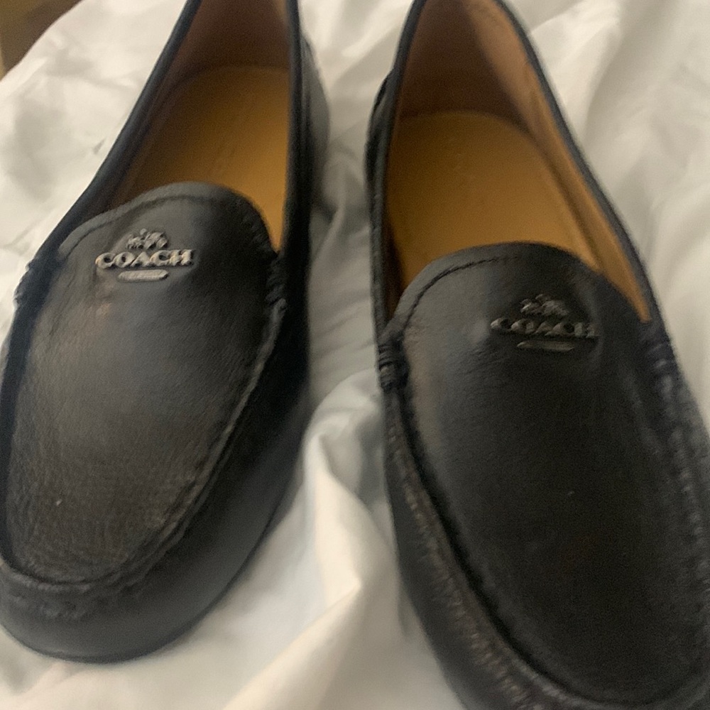 Never worn, coach slip ons